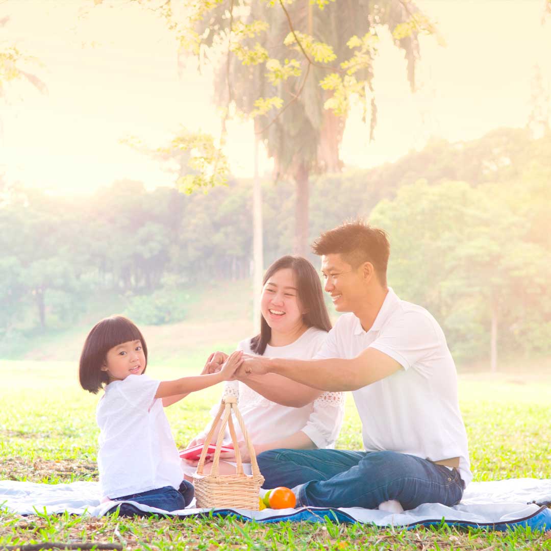 Smiling family enjoying mosquito-free outdoors.